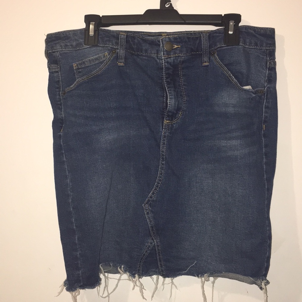 Blue jean skirt with distressed rips
